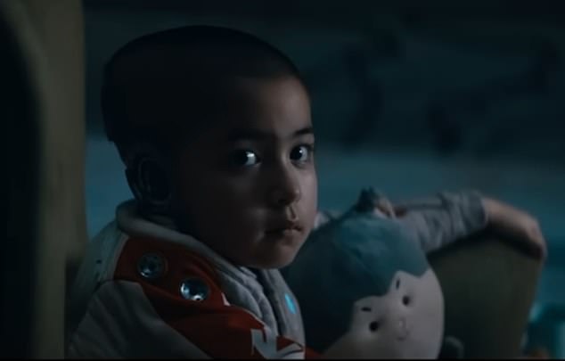 Set to hit theaters on September 28, the film focuses on a war between artificial intelligence and humans in which a child robot - played by Madeleine Yuna Voyles - pictured - holds the key to the future of human survival. 'humanity.