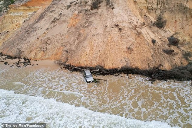 The driver of the Holden Jackaroo 4WD was forced to abandon the vehicle after it was struck by the crashing waves.