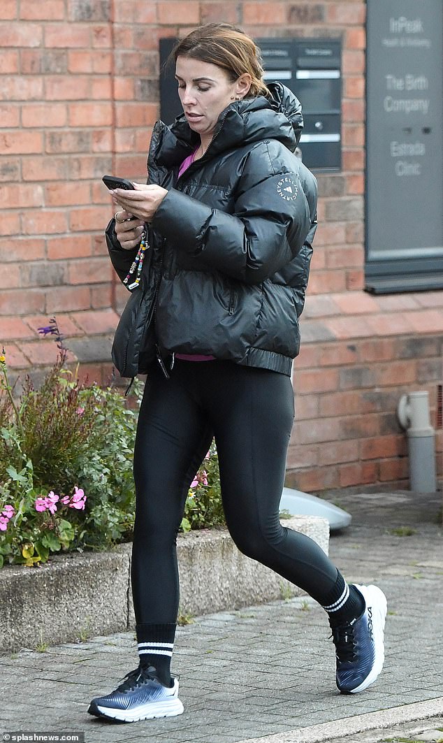 Relaxed: To keep warm, Coleen threw on a chunky puffer jacket and kept it warm with a pair of white and black trainers for her outing.