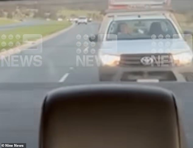 The passengers inside the vehicle didn't know what to do when a trader started following them and flashing his headlights.  The trader was subsequently arrested and charged.  Pictured: Images taken inside the car