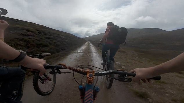 The monarch, 74, was hiking alone at his Scottish estate when he came across a group of mountain bikers who were filming their trip for a YouTube video.