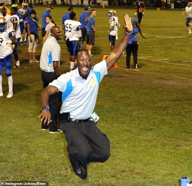 Mims in happier times with the football team at Minor High School in the Adamsville, Ala., suburb of Birmingham.