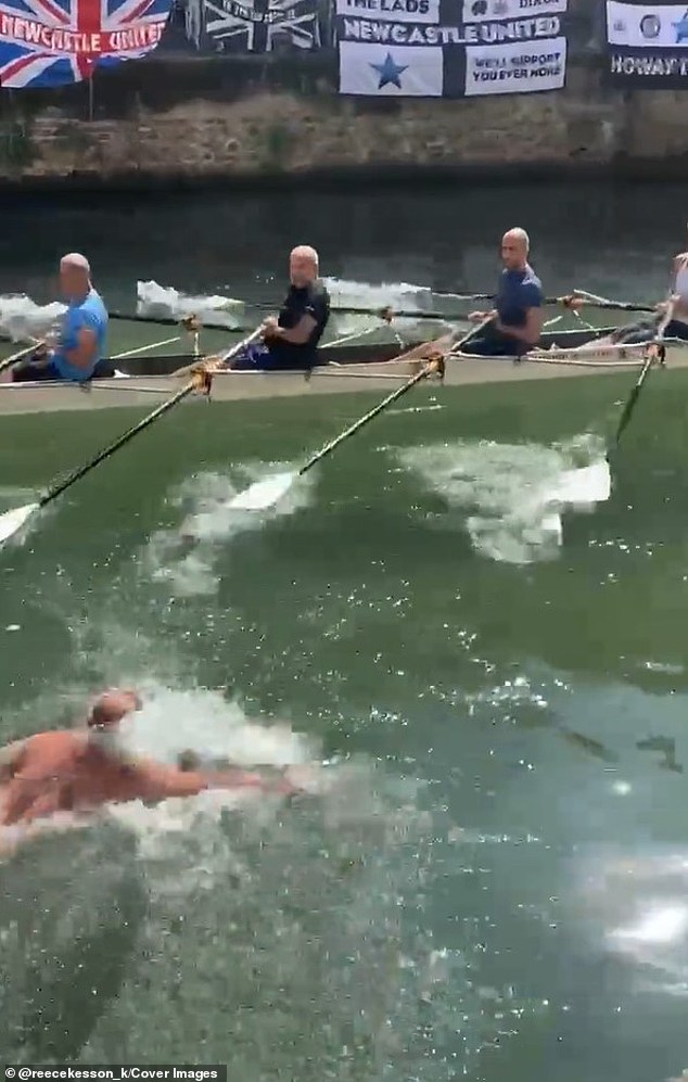 The men in the quad scull looked perplexed as the man desperately tried to confront them, before quickly running out of steam.