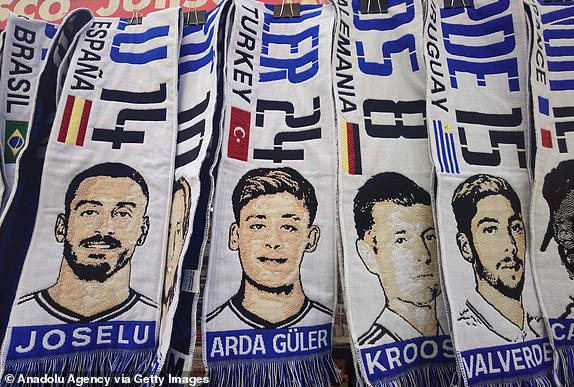 MADRID, SPAIN - SEPTEMBER 20: A view of fan items sold by street vendors around the Santiago Bernabeu stadium, including products of Real Madrid's Turkish player Arda Guler, before the Group C Week 1 match of the UEFA Champions League between Real Madrid and Union Berlin in Madrid, Spain on September 20, 2023. (Photo by Senhan Bolelli/Anadolu Agency via Getty Images)