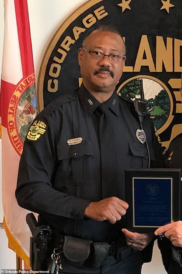 Orlando police school resource officer Dennis Turner, shown at his retirement ceremony in 2018, was fired for arresting the two children