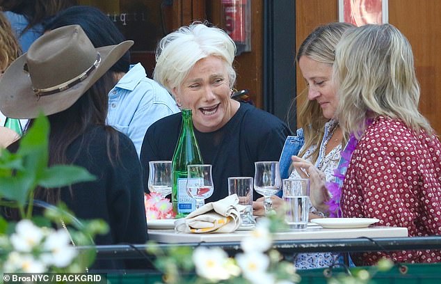 Banter: the actress was spotted sharing a joke with her pals in New York