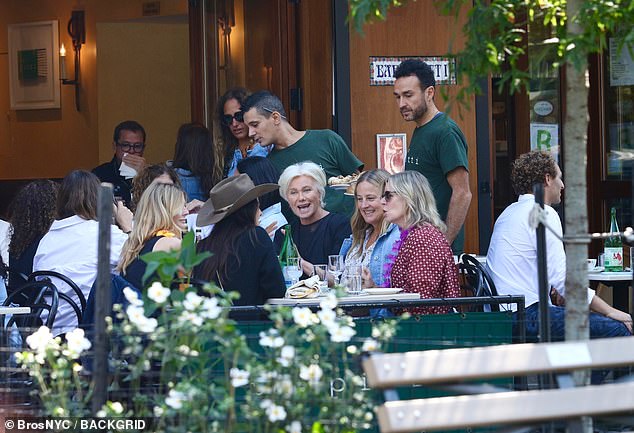 Chat: The group shared a joke while having lunch outdoors