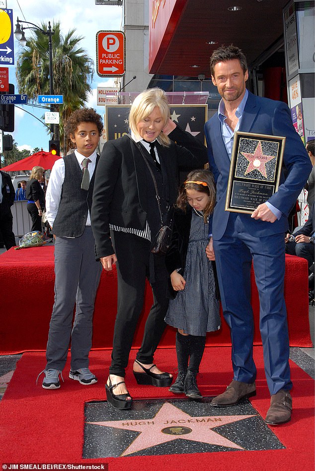 Family portrait 2012: In 2000, the Music Man actor and Furness adopted their son Oscar Maximilian, 23, in 2005, they adopted their daughter Ava Eliot, now 18 years old.