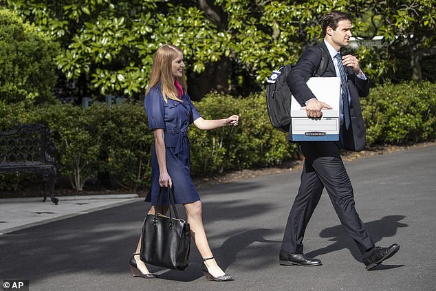 Michael, left, is seen on May 1, 2020, with Johnny McEntee, the former director of the Office of Presidential Personnel.