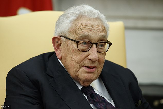 Pictured: Former Secretary of State Henry Kissinger speaks during a meeting with President Donald Trump in the Oval Office of the White House.