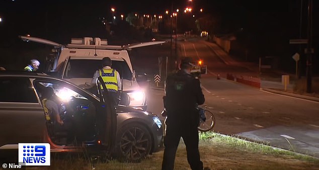 Western Australia Police say the 16-year-old driver, who suffered minor injuries, was unlicensed and speed may also have been a factor (police at crash scene at the intersection of Beach Rd and Parkland Dr)