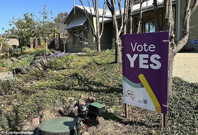 A family with a 'Vote Yes' sign on their lawn (pictured) has become the target of vile racist abuse for showing support for an Indigenous voice to Parliament