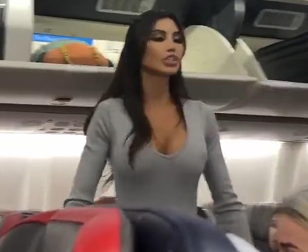 Unitard-wearing Morgan Osman in the now viral clip of her telling fellow bus passengers on an American Airlines flight: 'Film me - I'm Instagram famous, you f*****g bum'