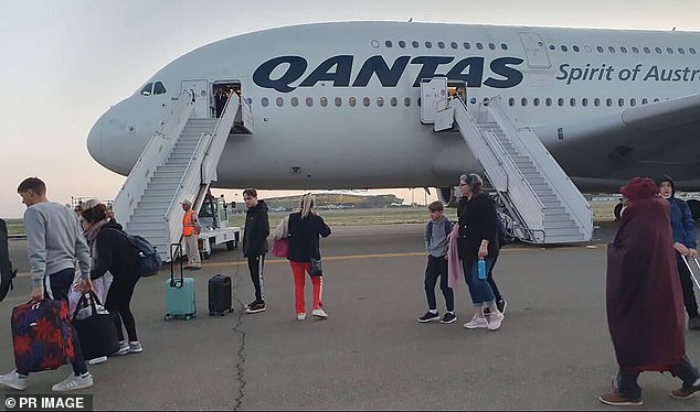 Passengers in Australia board planes via an aerobridge or by taking a short walk across the tarmac to a staircase (photo)