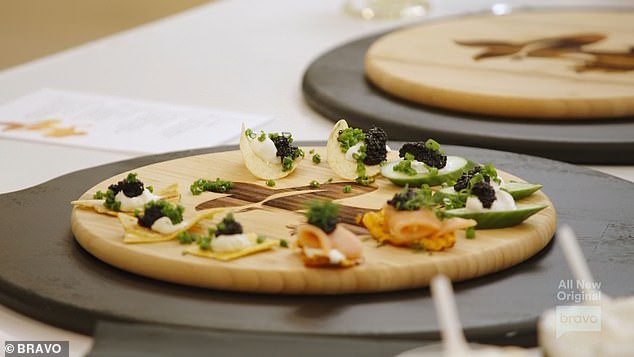 Pringles and caviar can be served with a wide variety of toppings.  The snack made for Erin's house guests consisted of caviar, cream and dill, on an original Pringle chip