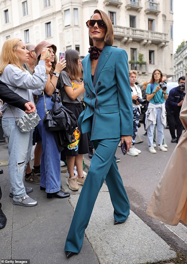 Stylish: The socialite looked stunning in the oversized double-breasted blazer, which she paired with matching straight-leg trousers.