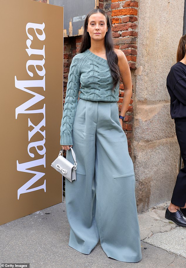 Wow: The granddaughter of King Juan Carlos I and Queen Sofia of Spain, Victoria de Marichalar y Borbón, 23, looked trendy in a blue one-shoulder knit sweater and wide-leg pants