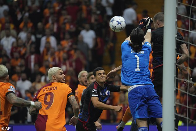 Grabara comes out to try to punch the ball as Galatasaray pile on the pressure