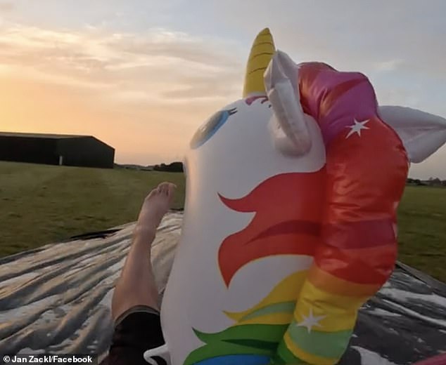 The video shows Jan coming down at high speed to land in his parachute, but he makes a quick turn to stand right in front of the slip'n'slide.