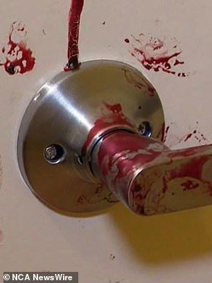 Blood was also smeared on the walls and door