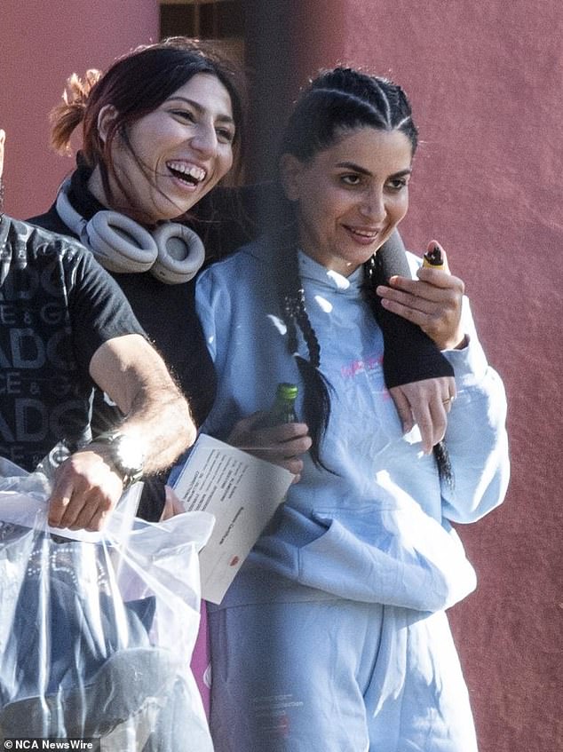 Susan Alameddine (in the blue tracksuit) is pictured leaving the Dillwynia Women's Correctional Center on Thursday