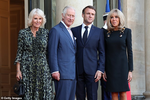 The neighborhood smiled as they posed for photos on the steps of the palace (photo L-R: Queen Camilla, King Charles, French President Emmanuel Macron and his wife Brigitte Macron)