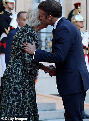 The French president (photo) greets Queen Camilla