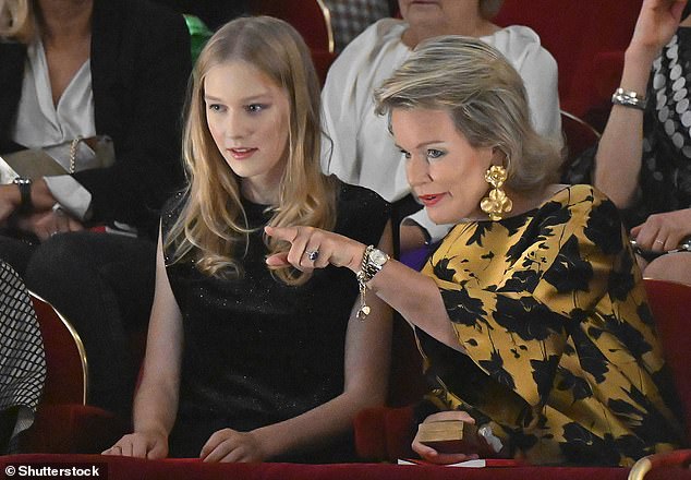 During the opera, it seemed as if Queen Mathilde was explaining something to her daughter, who looked as if she was listening intently to her mother.