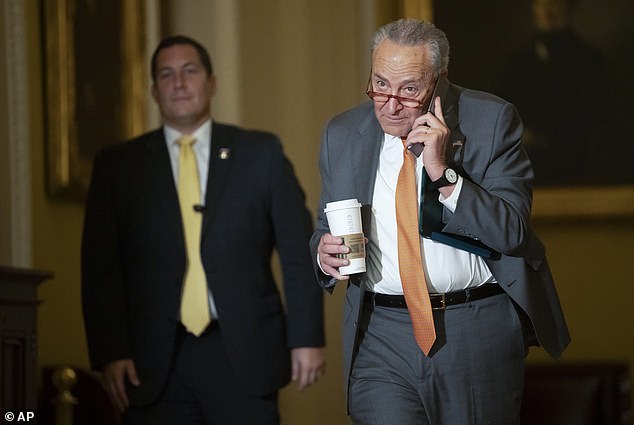 Senate Majority Leader Chuck Schumer, allowing Senator Fetterman to walk across the Senate floor without a coat and tie