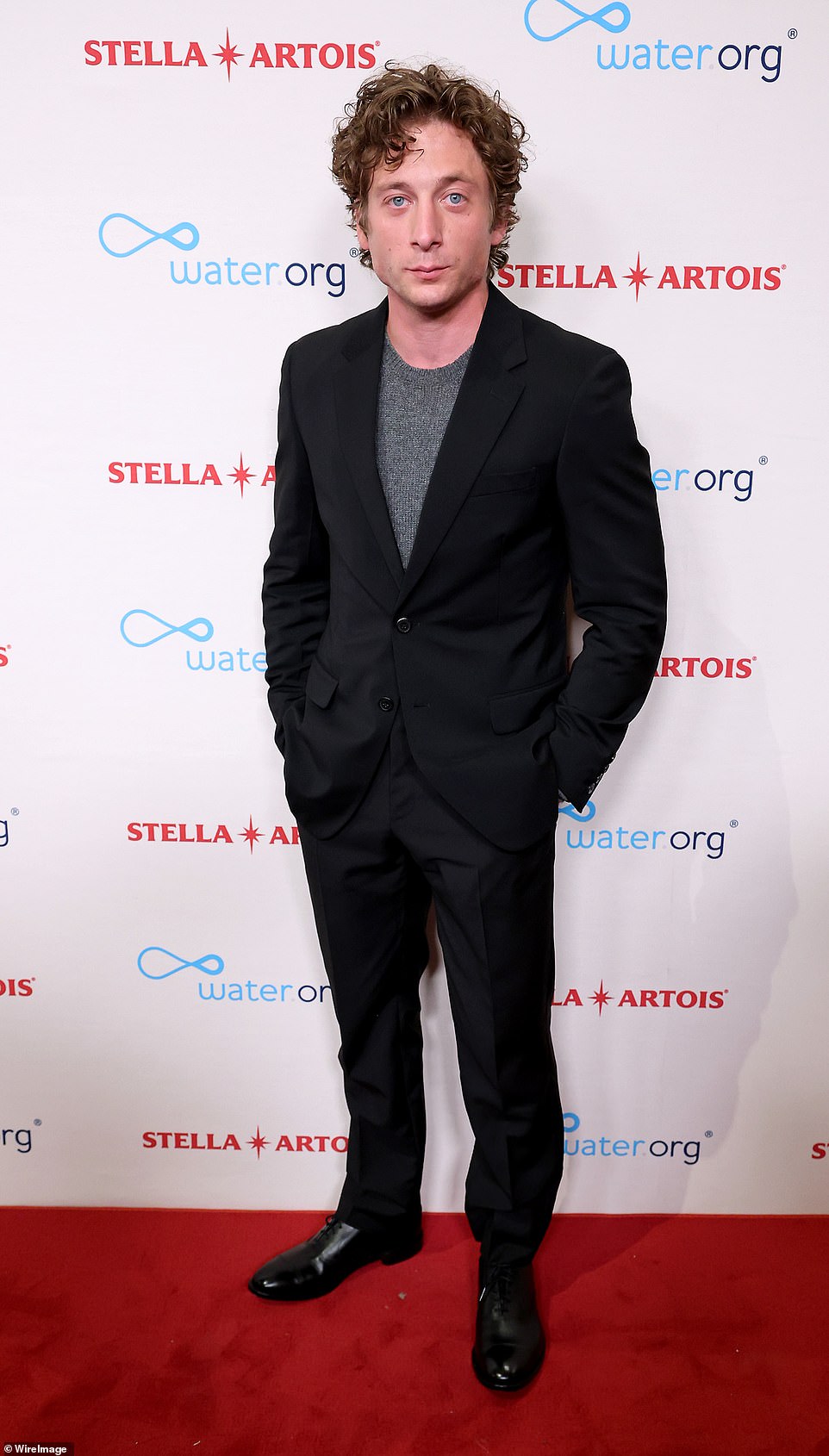 Looking good: Jeremy, who stars in the hit Hulu series The Bear, wore an understated black suit and gray sweater