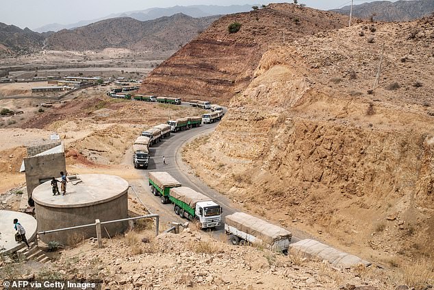 A convoy of World Food Program (WFP) trucks is pictured heading towards Tigrayn, Erebti village, Ethiopia, on June 9, 2022