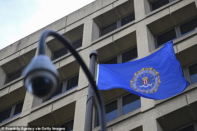 A security camera can be seen near the Department of Justice in Washington DC