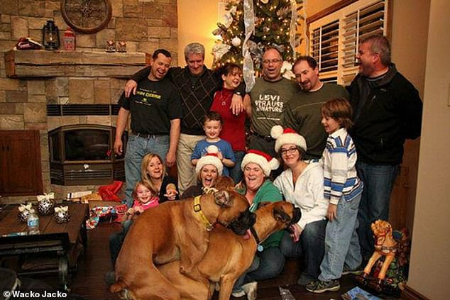 Stole the show!  It looks like two dogs in the US chose Christmas photo time to get a little playful