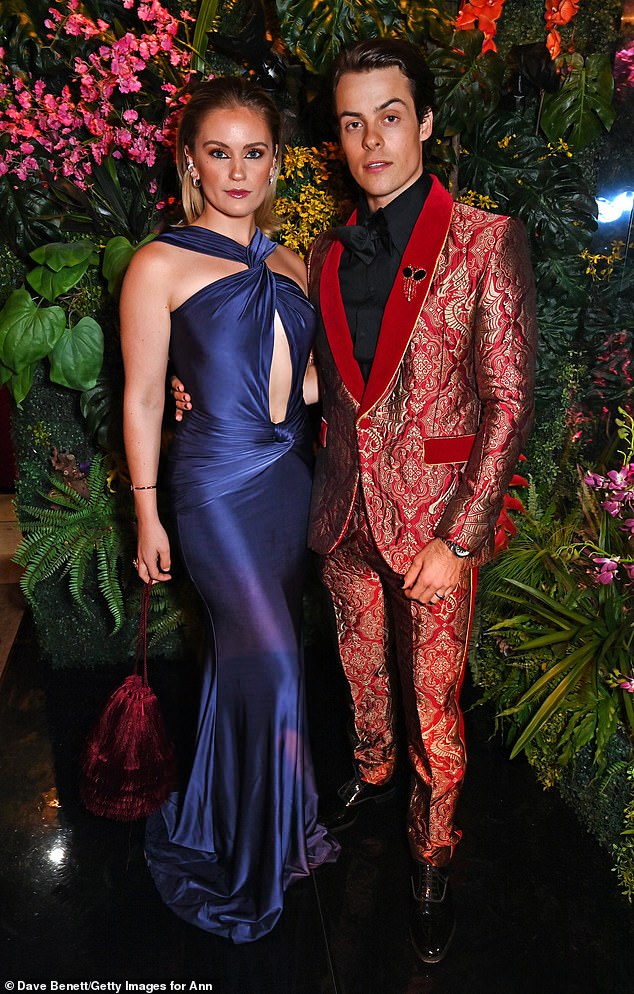 Sophisticated: Alicia Agneson and Herman Tommeraas stood out in their colorful ensembles