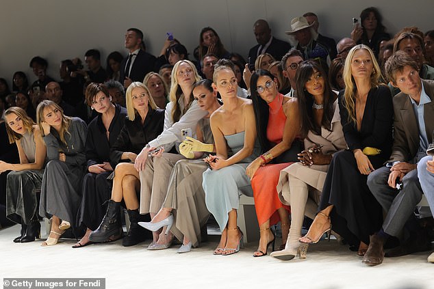 World apart: Rumors started to build when both Naomi (third from right) and Linda (third from left) were not seated next to each other when they both attended the Fendi Milan Fashion Week show