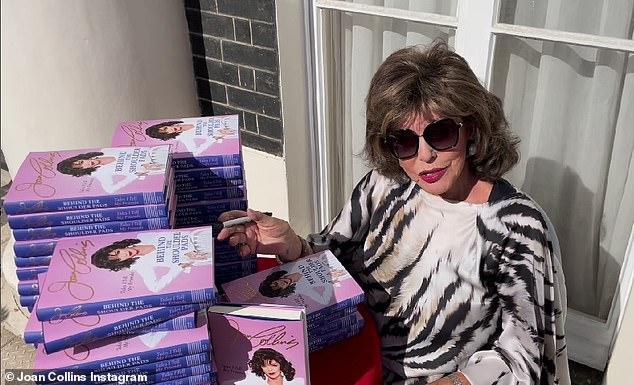 In demand: Earlier this week, Joan took to her Instagram as she shared a clip among stacks of copies of her book as she personally signed them all