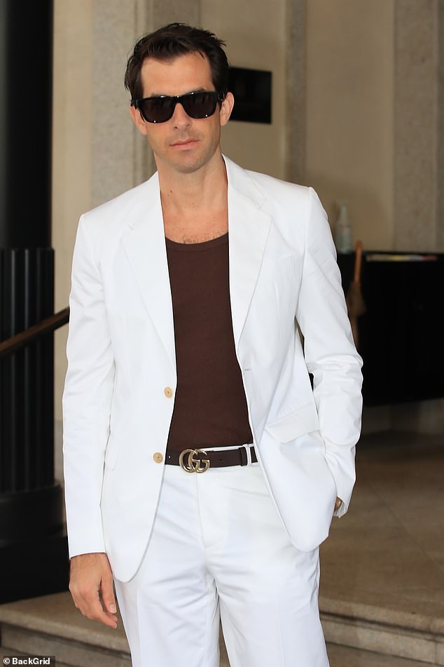 Slick: Ryan wasn't the only man flying the flag in fashion, as Mark Ronson was hot on his heels in a sharp white suit with a black T-shirt underneath