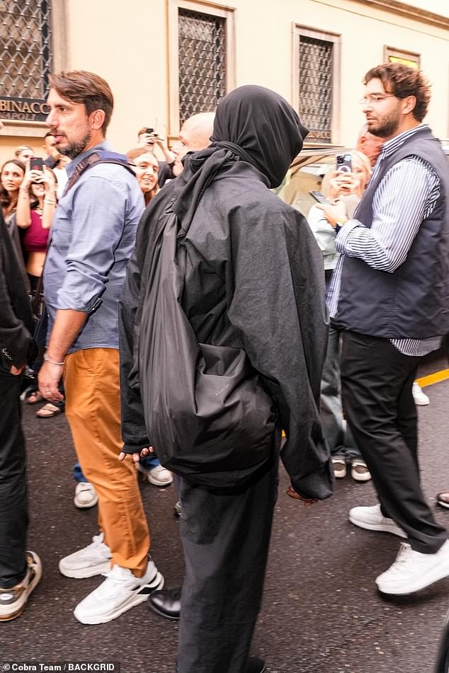 He is gone!  Kanye met a swarm of admirers when he took to the streets