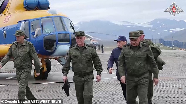 In August, Russian Defense Minister Sergei Shoigu (right) made an official visit to Novaya Zemlya, raising fears about Moscow's plans to resume nuclear testing.