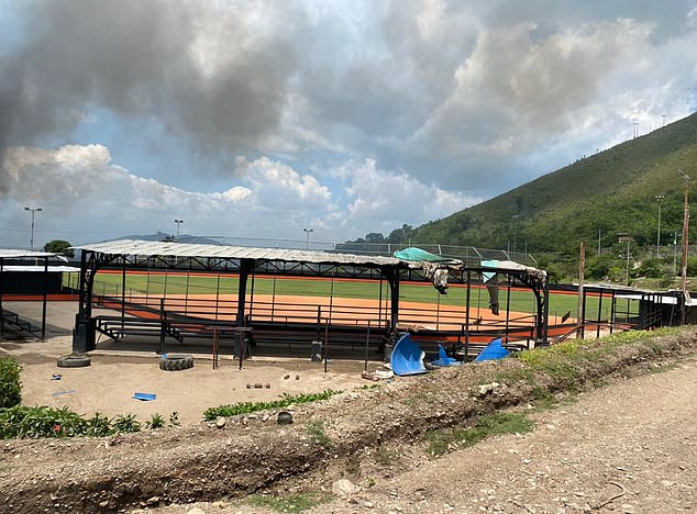 Inmates played softball and baseball on a well-maintained field in the prison that also had lights