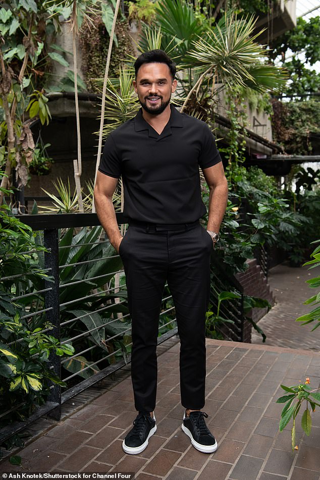 Trendy: Singer Gareth looked stylish in all black, wearing a plain collared T-shirt and smart trousers