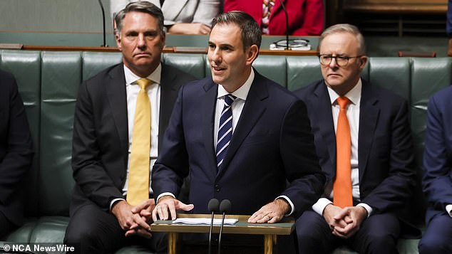 Deficits are forecast for the next 40 years, despite Australia posting a surplus in the 2022-2023 financial year.  The photo shows Jim Chalmers during question time