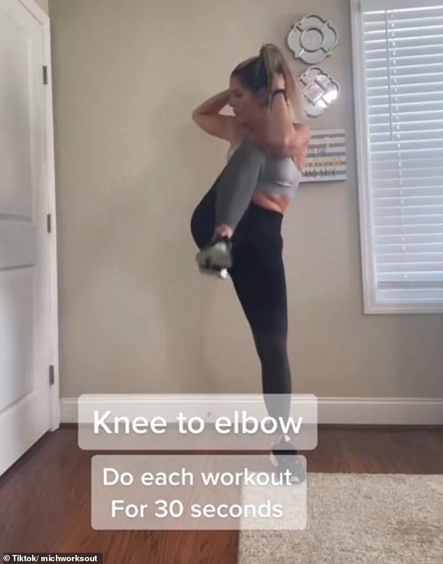 Michell started her workout with standing knee-to-elbow crunches.  She does each exercise for 30 seconds and repeats the sequence three times with a 90-second break in between