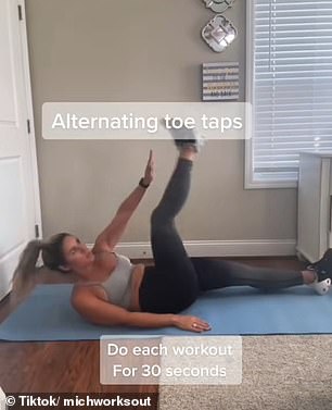 Michelle lay back on her back to complete the fifth exercise, alternating between tapping with her legs straight.  She completed the sequence with a 30-second bow-legged lap