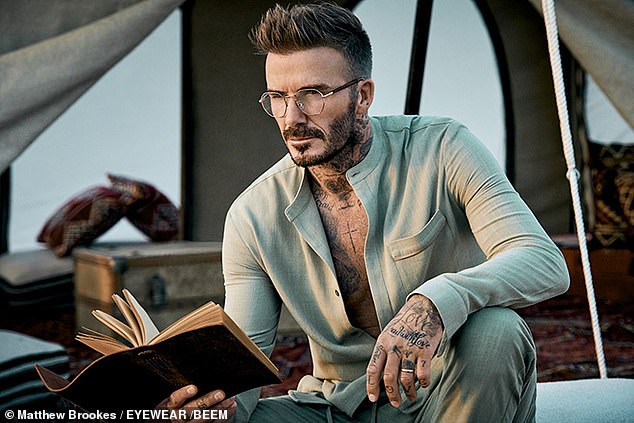 David Beckham wears his latest creations to promote his new range of specs