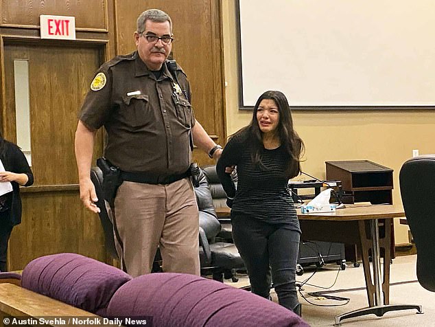 Celeste Burgess, 19, cries after being sentenced to 90 days in jail after pleading guilty to removing, concealing or abandoning body