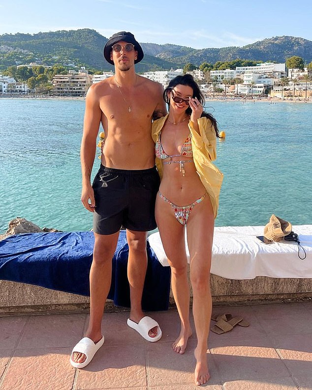 In the footage, the former Bachelor star showed off her toned curves and shapely bum in a skimpy swimsuit while on holiday with her football boyfriend Ben.