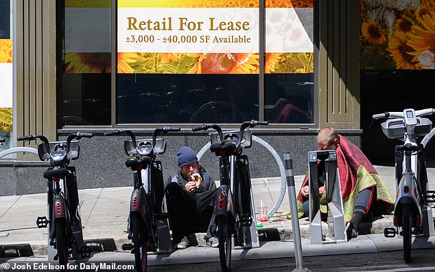 People taking drugs outside a store in San Francisco last month, as Mayor London Breed continues to face criticism for her handling of the problems facing the city