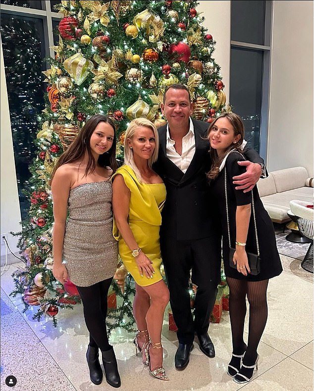 With the family: In December they posed with his two teenage daughters