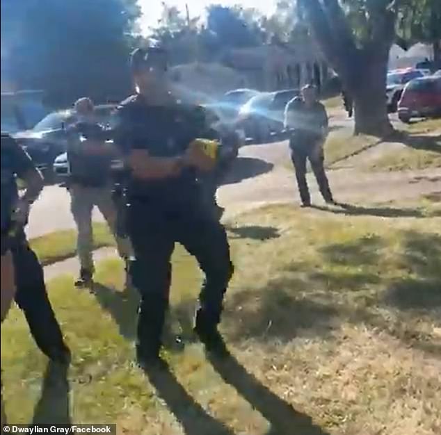 In the video, recorded by a family member, Burley is seen walking away from the vehicle and away from police officers shouting instructions at him.